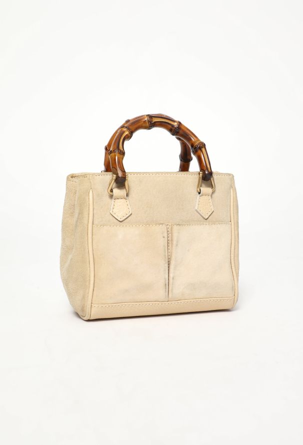 バッグ 90's MIU MIU Bamboo Handle Suede Bag Miu Miu, a brown suede handbag. - Bukowskis