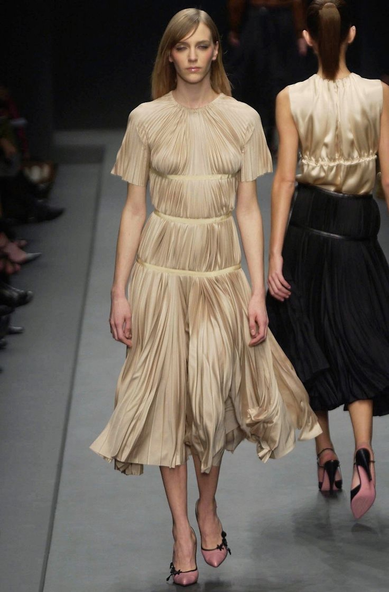runway designer dress pleat This pleated spiral structured dress is crafted to embody bold elegance and artistic precision, this design features sculpted lines that fall gracefully around the silhouette, creating a striking sense of