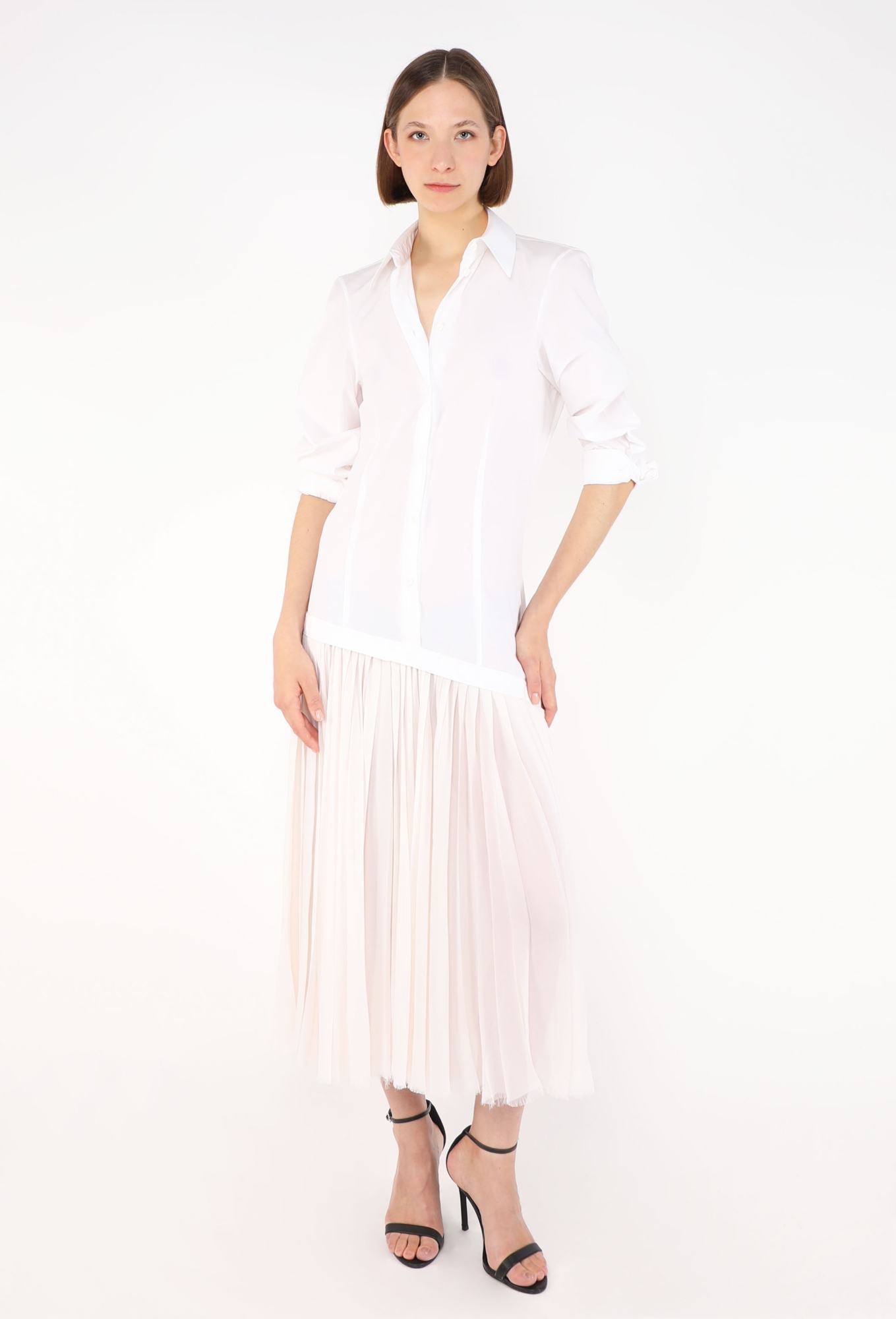 celine white shirt dress The Celine Dress in Cotton Poplin in white is the epitome of effortless style. It comes in a classic fit and midi length, beautifully detailed with an open crew neck and soft
