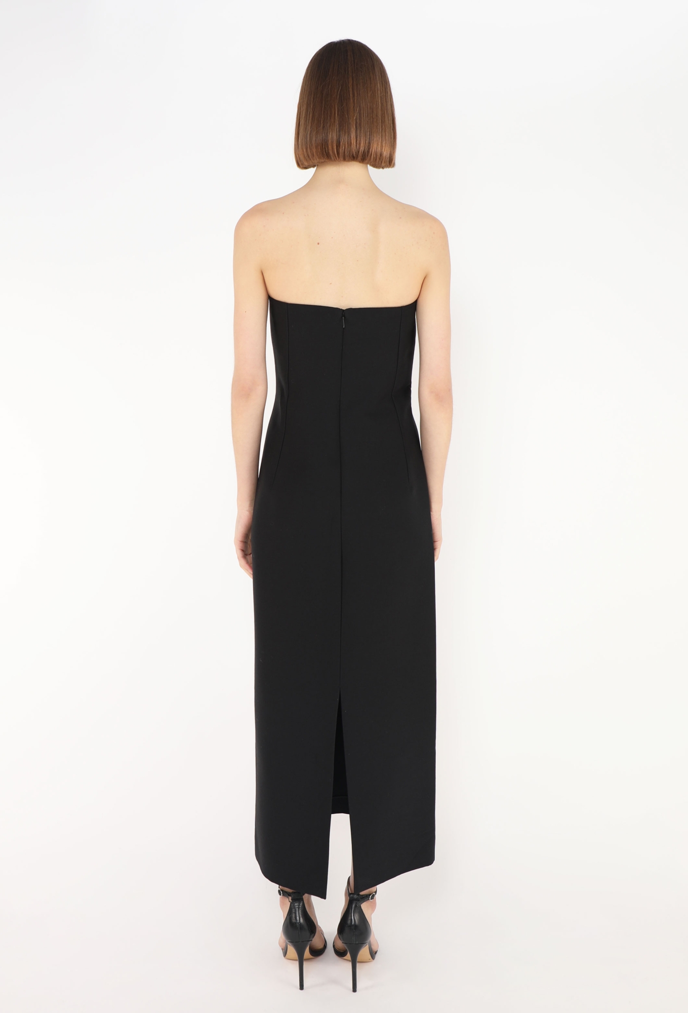 the row dress Eveline | tweed for a slim fit and has a split hem thats gently frayed. Editor's Pick: The Row x
