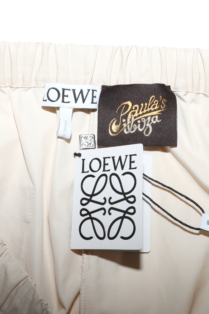 LOEWE Paula & Mopriz チノパンアイボリー x Paula's Ibiza Wide-Leg Pleated Pants, 2026 - Loewe | ReSee